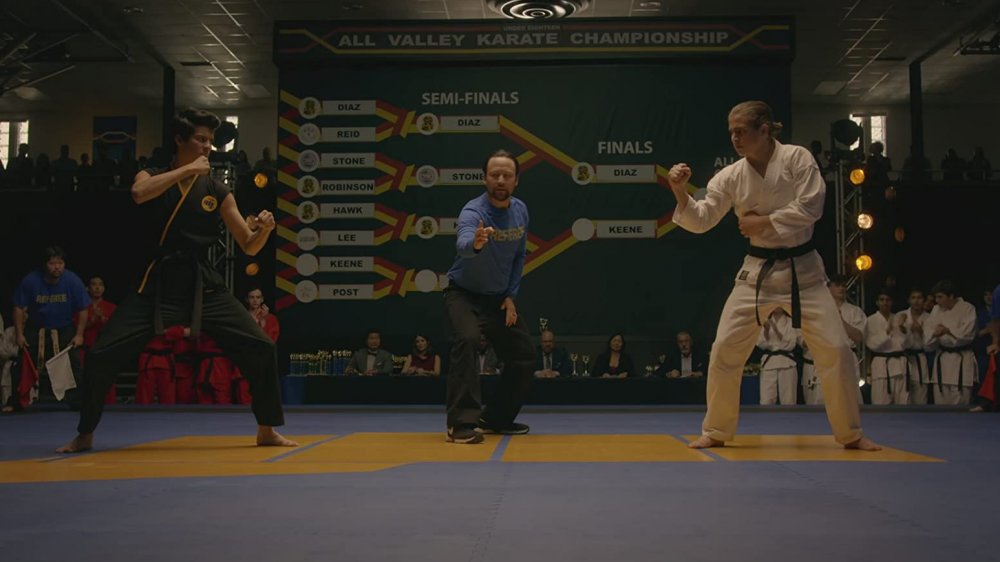 Xolo Maridueña and Tanner Buchanan as Miguel Diaz and Robby Keene on Cobra Kai