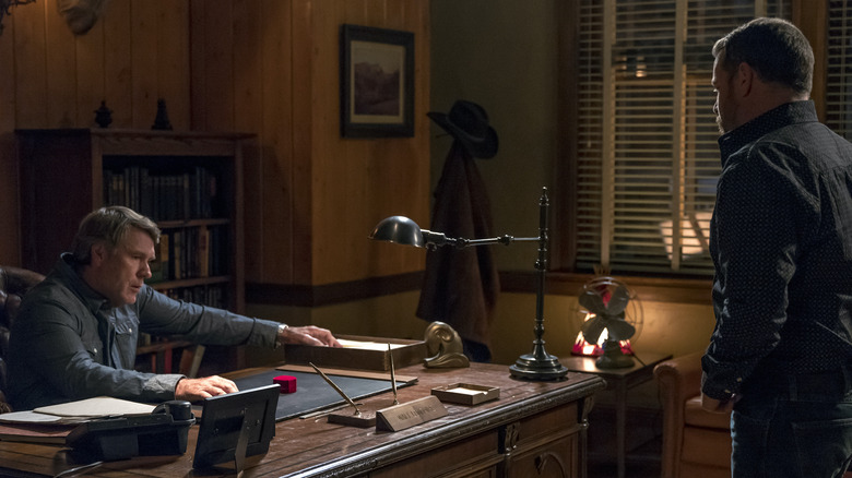 Walt Longmire sitting desk