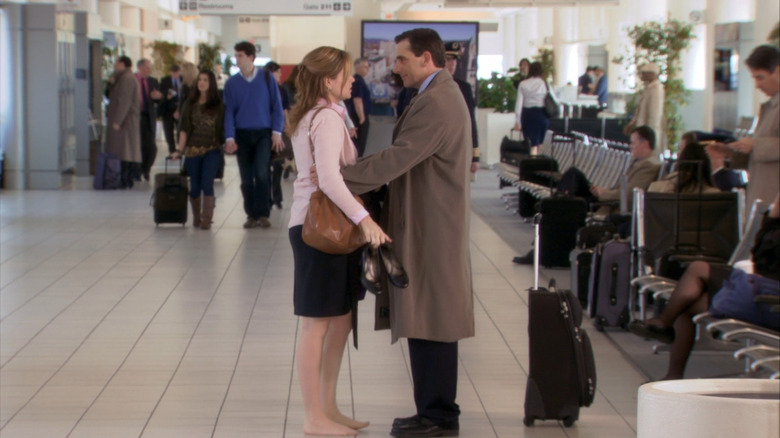 Pam and Michael embracing