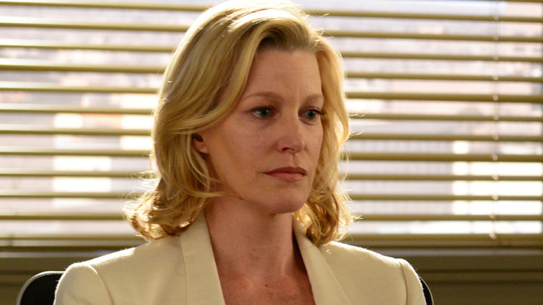 Skyler White looking serious in blazer