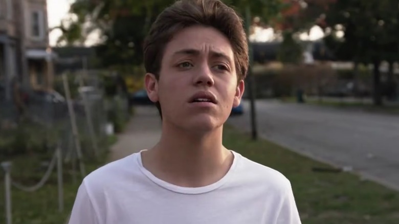 Carl Gallagher wearing a white T-shirt on Shameless