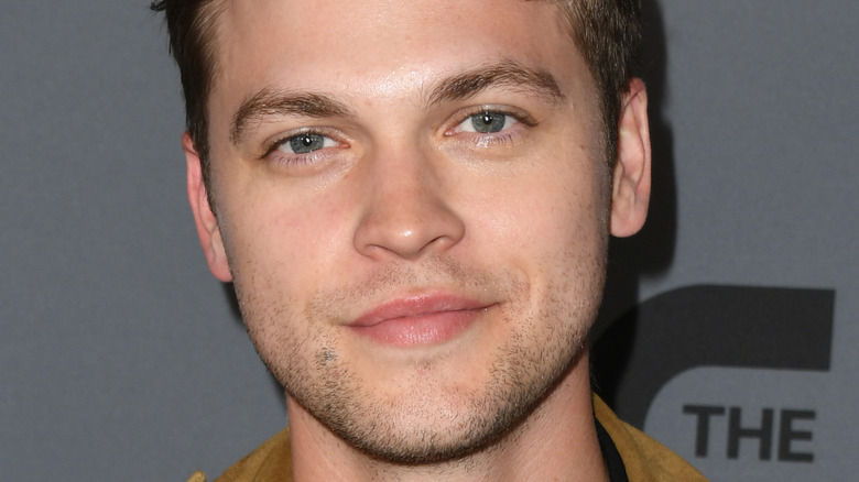 Alexander Calvert smiling