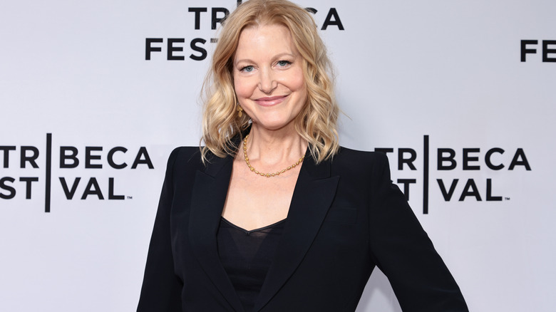 Anna Gunn smiles for photos at the Tribeca Film Festival in 2022