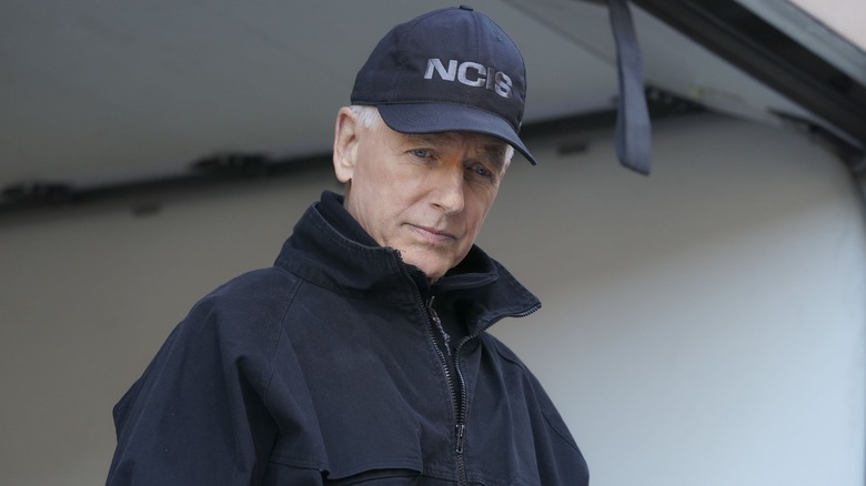 Gibbs in NCIS hat looking down