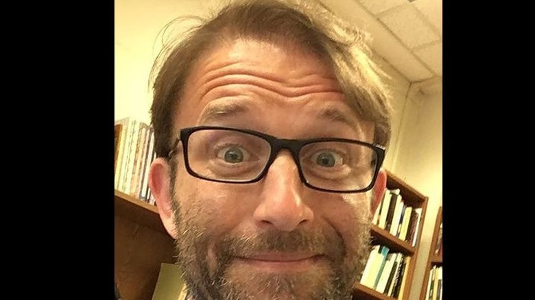 Professor Ilan Mitchell-Smith in glasses