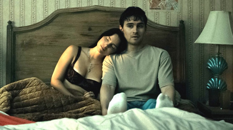 Nikki leans on Bear in "Obsession" (2025)