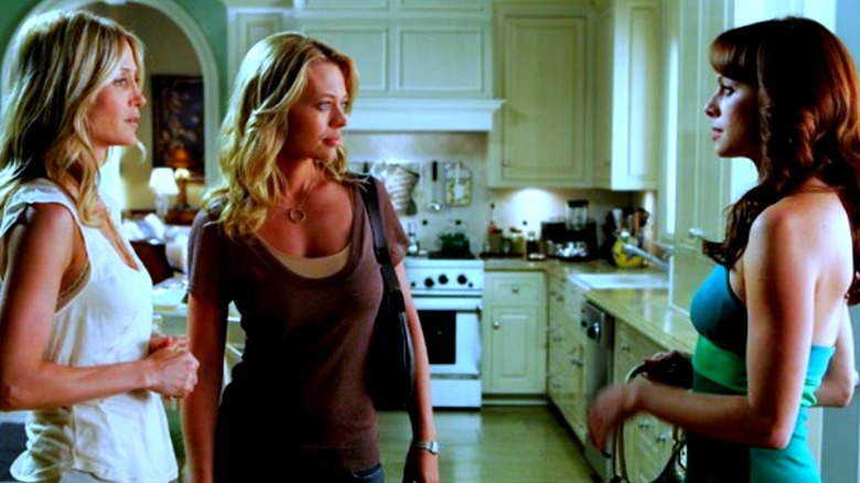 Kirsten, Charlotte, and Julie in a kitchen on The O.C.