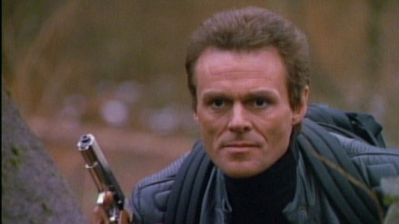 Michael Des Barres as Murdoc in MacGyver