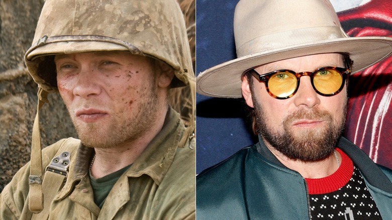 Leyden sits in a bunker and squints at the sun, Brendan Fletcher wearing yellow sunglasses
