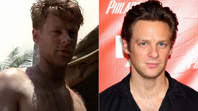 A shirtless Hoosier walks through camp, Jacob Pitts on the red carpet