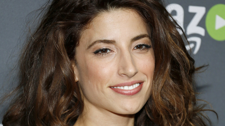 Tania Raymonde smiling