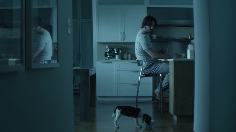 John Wick sitting next to Daisy