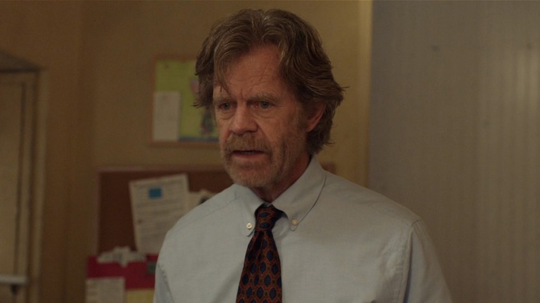 Frank Gallagher wearing a shirt and tie