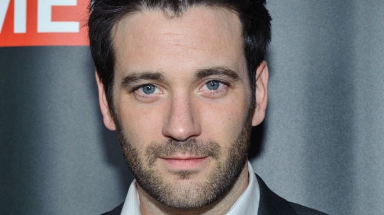 Colin Donnell looking forward at a premier 