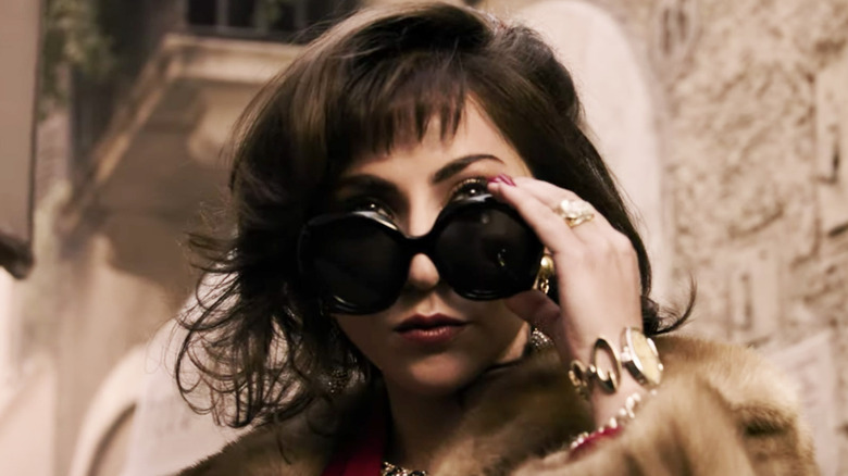 Lady Gaga pulling down sunglasses