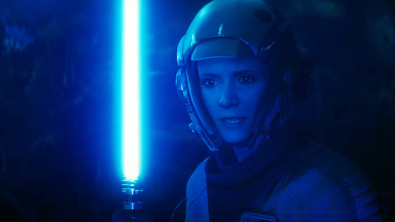 Princess Leia wielding lightsaber