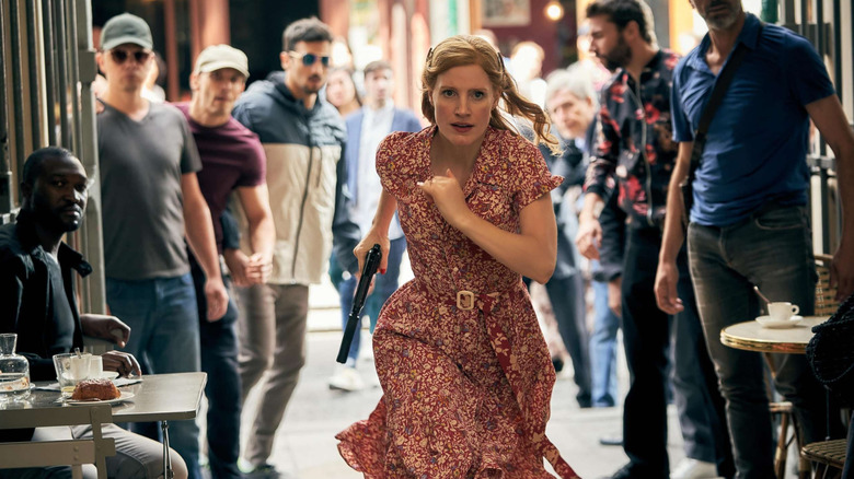 Mason "Mace" Browne on a chase through the streets in The 355 (2022)