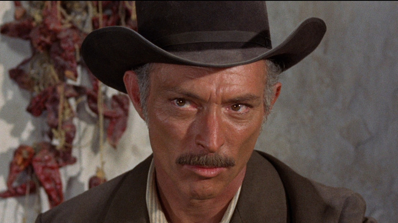 Frank Talby looking off camera