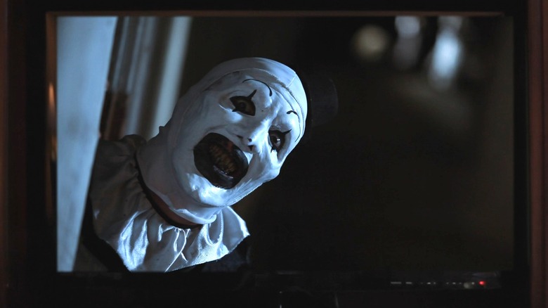An image of Art the Clown on a TV screen in "All Hallows' Eve." (2013)