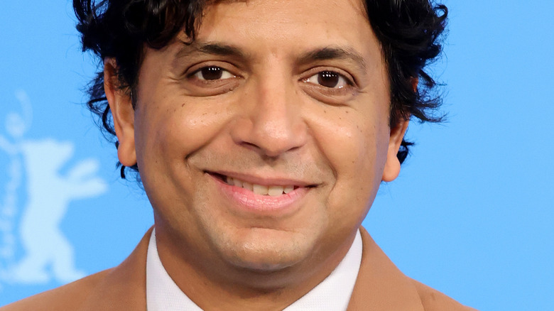 M. Night Shyamalan smiling