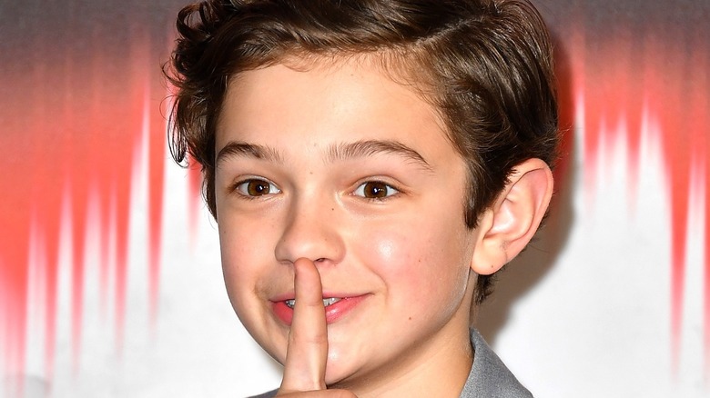 Noah Jupe posing at premiere