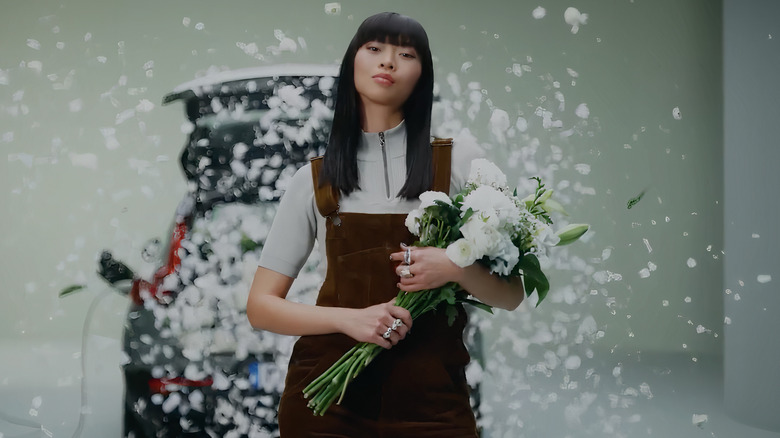 Woman holding flowers 