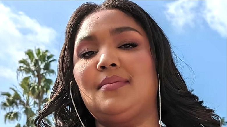 Lizzo smiling in the Google Pixel ad