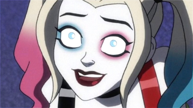 Harley Quinn looking up while smiling