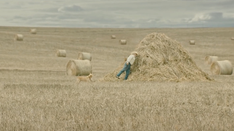 The cowboy retrieves his iPhone