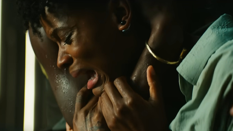 Shuri crying in someone's arms