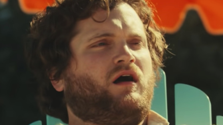 Man staring at beach