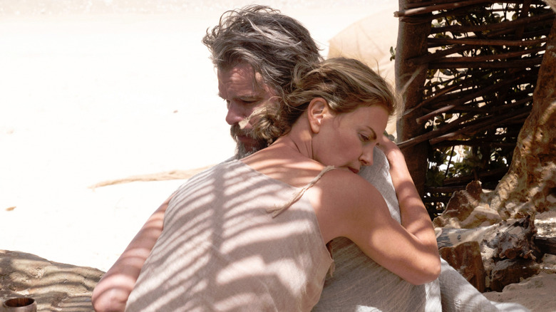 Calypso and Odysseus hugging in The Odyssey (2026)