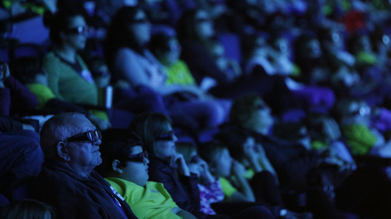 audience in 3-D glasses