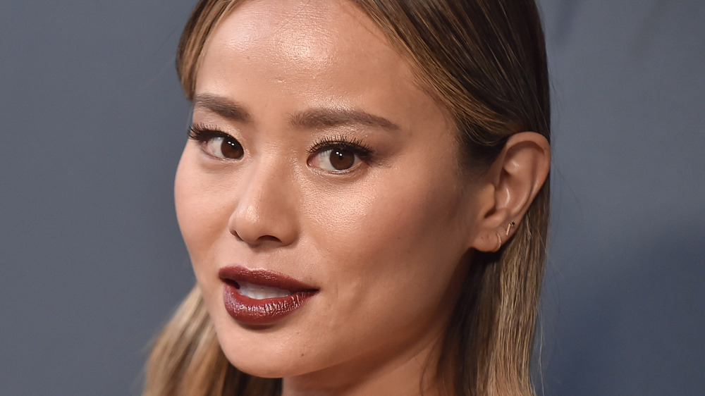 Jamie Chung slightly smiling