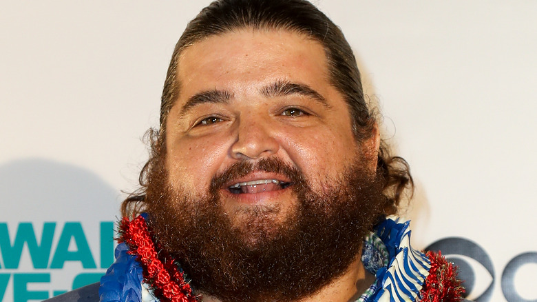 Jorge Garcia with leis