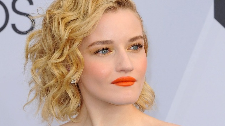 Julia Garner looks into distance