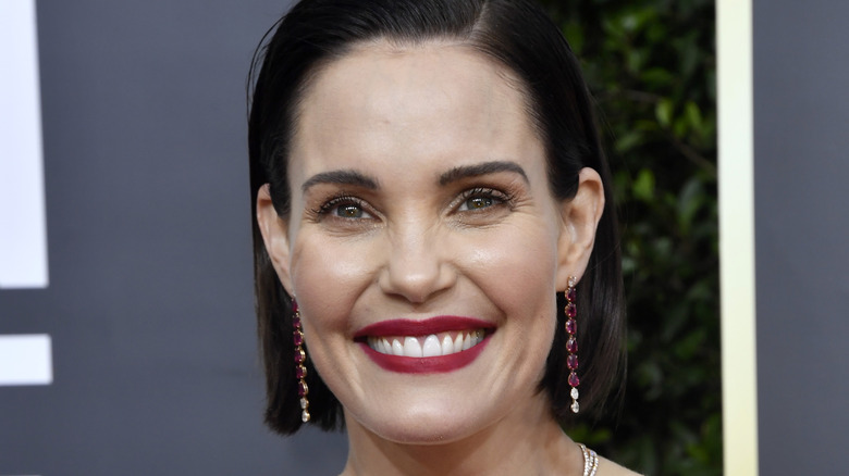 Leslie Bibb smiling with dark hair