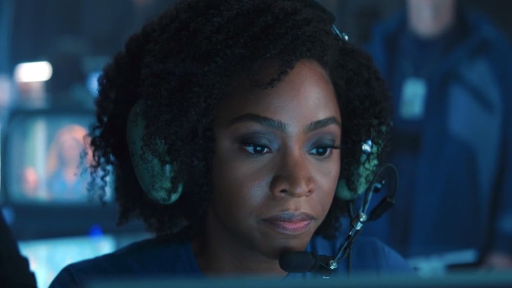 Monica Rambeau piloting drone wearing headset