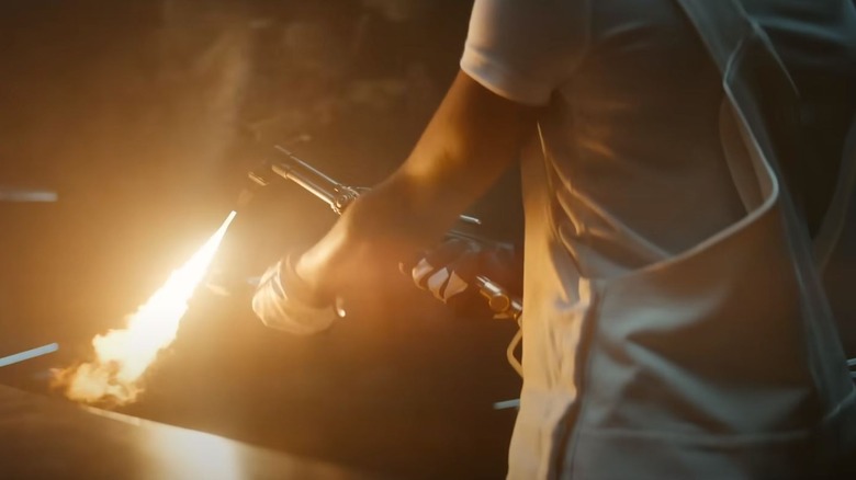 Riri Williams using a blowtorch