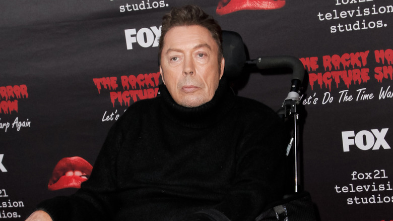 Tim Curry at event in wheelchair