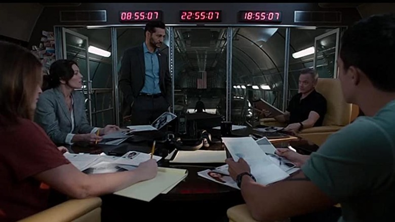 The IRT conferring at a table