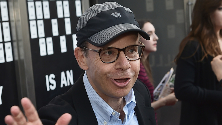 Rick Moranis waving