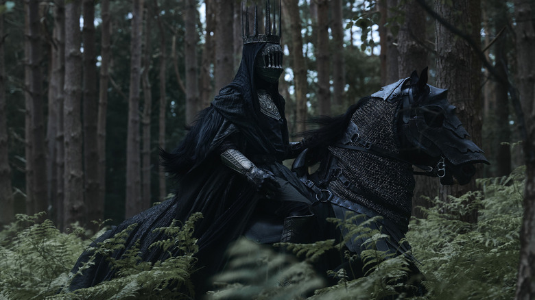 A Nazgnagôl on horseback in a forest in Season 3 of "The Rings of Power" (2022-present)