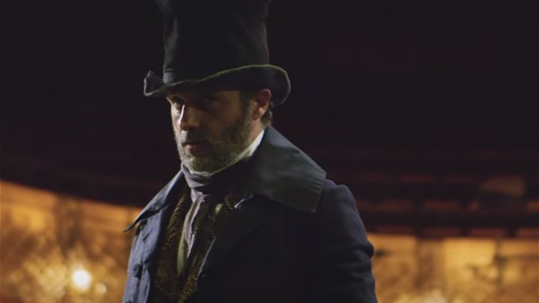 Scrooge glowering