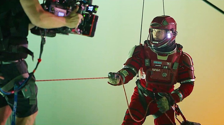 A camera operator recording Ryan Gosling in his space suit in "Project Hail Mary"