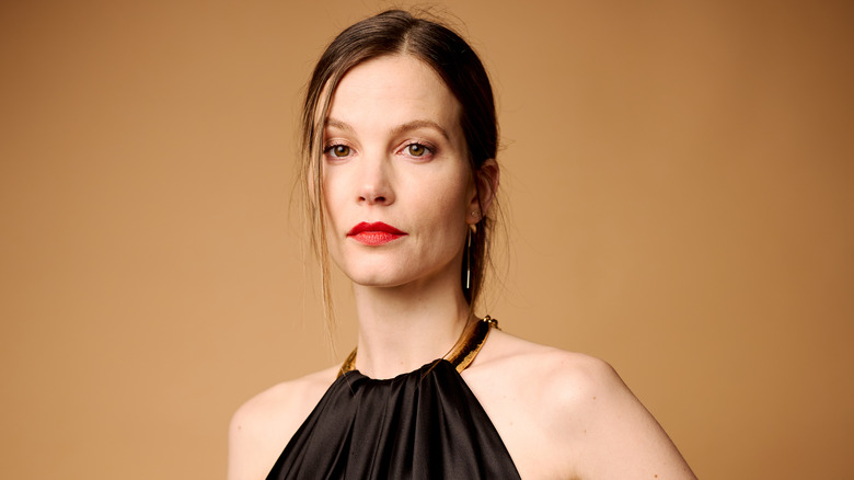 Sylvia Hoeks wearing a black dress
