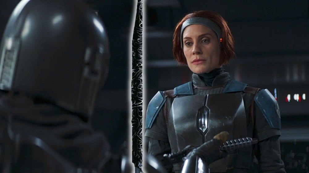 Bo-Katan eyes the Darksaber