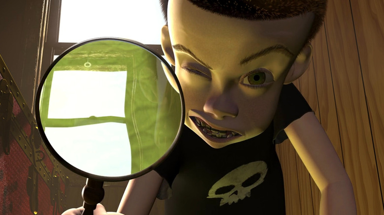 Sid looking through magnifying glass