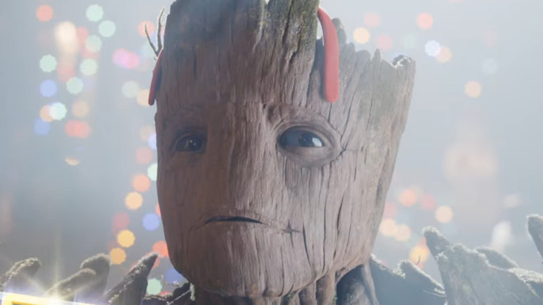 Groot wearing Christmas reindeer horns