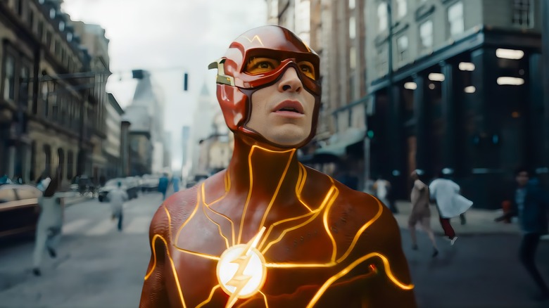 The Flash sensing danger in his red lightning suit